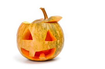 A pumpkin lantern, a Halloween attribute resembling a head with a frightening or funny face, shot against a white background.