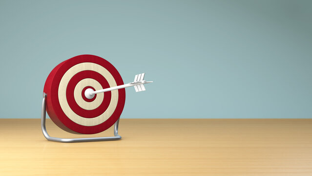 3D tabletop shot white arrows in the target bullseye on neutral background. Business target or goal success and winner concept.
