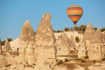Fototapeta na wymiar Balloons in love valley, Cappadocia. Flights in Goreme. Turkey