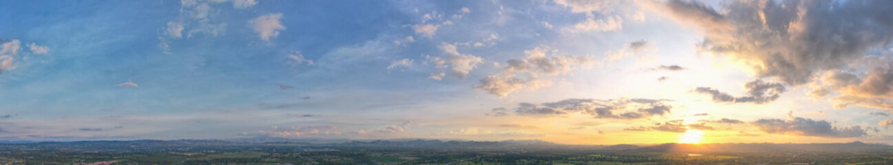 Fototapeta premium Aerial view of the sky, Panoramic beautiful landscape with sky on a sunny day, Sun bursting through clouds.