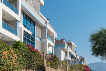 Cityscape of a residential area with modern apartment buildings.