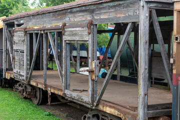 Fototapeta na wymiar old broken and abandoned wooden tyren wagon