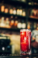 Bloody Mary cocktail in glass at the bar counter.