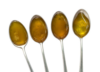 Isolate above four teaspoons of honey in a variety of measures, prepared to make herbal medicines.