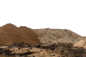 Large piles of sand hills, which traces its feet to walk around the area and a car park with a backhoe.