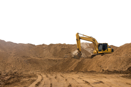 Loader backhoe parked there on the mountain, which has a large pile of sand in the wheel tracks below.
