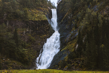 Huldefossen waterfall in Norway landscape scandinavian nature landmarks beautiful destinations