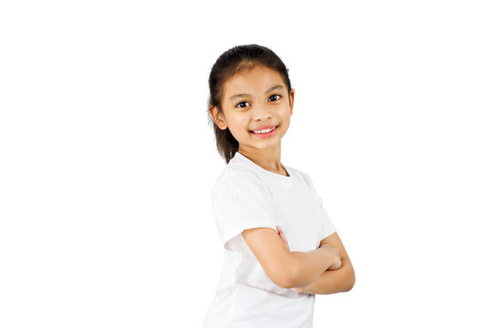 Young Asian girl standing with folded arms and smiling isolated on white background with clipping path.