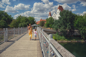 people walk across the bridge to Ingolstadt
