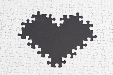 Close-up of blank white jigsaw puzzle texture background
