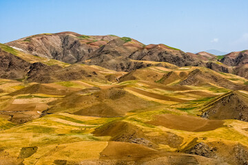 Fields and mountains in the north of Afghanistan near Faizabad city