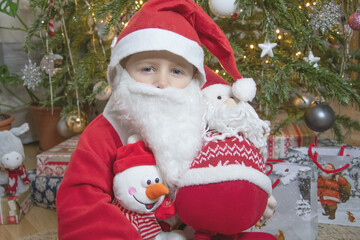 European boy in a Santa suit, Christmas, New Year