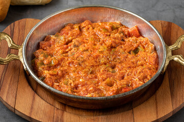 Traditional turkish breakfast food menemen made by eggs and tomatoes - obrazy, fototapety, plakaty