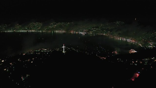 Aerial shot of the cityscape in Acapulco, Mexico at night