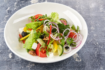 greek salad on the white plate