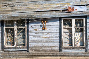 Old wooden windows with metal grid