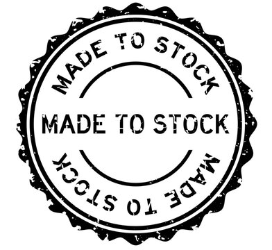 Grunge black made to stock word round rubber seal stamp on white background