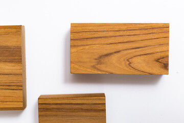 Natural Teak wood cube on white background