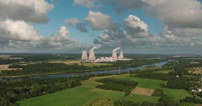 View of drone of nuclear power plant and river. Aerial panoramic flight of around the nuclear power plant.