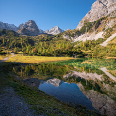 Fototapeta na wymiar pictorial alpine landscape lake Seebensee, Mieminger alps, with water reflection