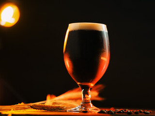 A glass of dark craft beer, coffee cream stout.