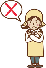 バツのポーズをする、エプロン姿の女性。