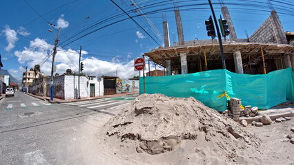 Construction site on a corner, in a residential area in Cotacachi, Ecuador, taken with a fisheye lens