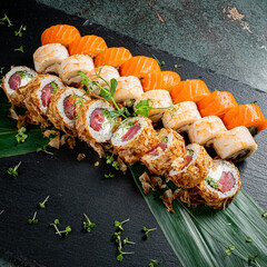 tasty sushi on the black stone