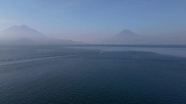 Beautiful aerial cinematic footage of the Panajachel town next to the Atitlan lake in Guatemala.