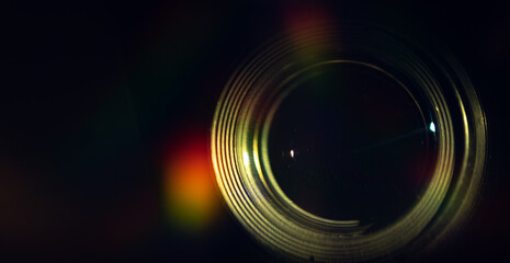 Camera lens on dark background