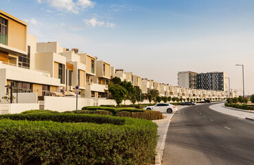 Dubai, UAE - 08.16.2022 - Close up shot of a f modern townhouses in Dubai South district. City