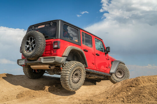 Loveland, CO, USA - August 27, 2022: Jeep Wrangler, Rubicon model,  on a training drive off-road course.