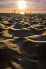 Sand on the beach during sunset