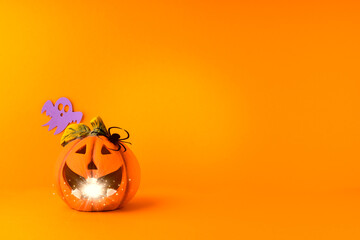 Happy halloween holiday concept. Jack o lantern, handmade paper decorations, spiders, ghosts on...