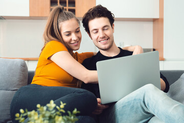 Young couple enjoying internet time