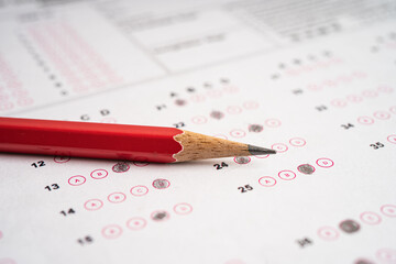 Answer sheets with pencil drawing fill to select choice, education concept.
