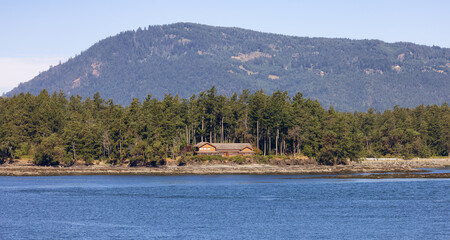 Canadian Landscape by the ocean and mountains. Summer Season. Gulf Islands near Vancouver Island, British Columbia, Canada. Canadian Landscape.
