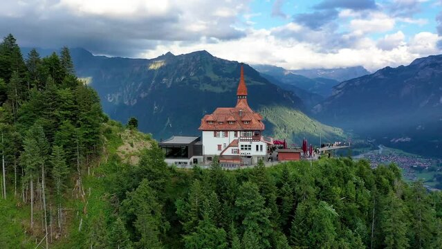 Beautiful top of Harder Kulm in Swiss Interlaken in summer sunset. Turquoise Lake Thun and Brienz in background. Stunning scenery on top of Harder Kulm over Interlaken. Berner Oberland, Switzerland
