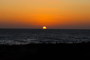 Sunset at La Barrosa beach in Sancti Petri, Cadiz, Spain