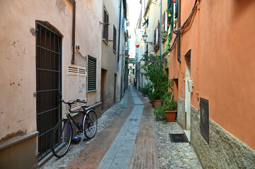Colorful glimpse of ancient narrow streets Carrugi typical of Ligurian Riviera towns