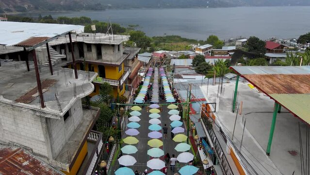 Beautiful aerial cinematic footage of the Panajachel town next to the Atitlan lake in Guatemala.