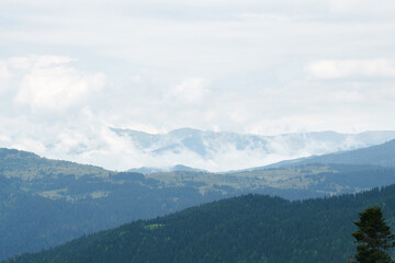Mountain landscape in clouds and haze