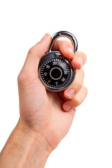 Human hand holding up a round closed locked coded padlock, closeup. Security, data safety,...
