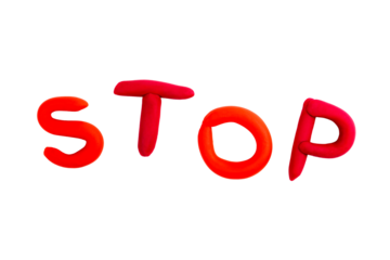 Simple bright red STOP word, text, letters made of plasticine, font isolated on white cut out Stop sign symbol, danger, warning abstract concept Kids arts and crafts, characters, font, modeling clay