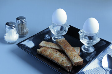 Soft-boiled eggs with toast soldiers for dipping.