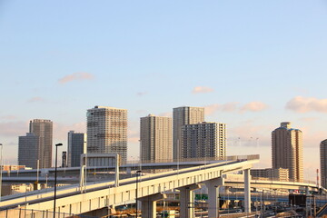 Buildings and highway at dusk