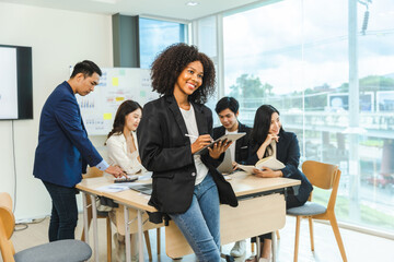 Mix race young start up business people meeting at office desk in modern workplace.