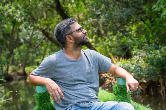 Young indian man exploring honnavar back water