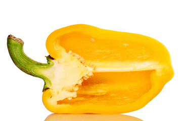 Naklejka na ściany i meble One half of bright yellow, organic ripe juicy bell pepper, close-up, on a white background.