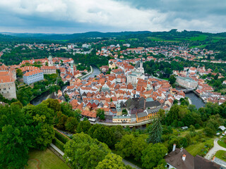 Fototapeta na wymiar Czechia. Cesky Krumlov. A beautiful and colorful historical Czech town. The city is UNESCO World Heritage Site on Vltava river. Aerial view from drone. Czech, Krumlov. Europe. 